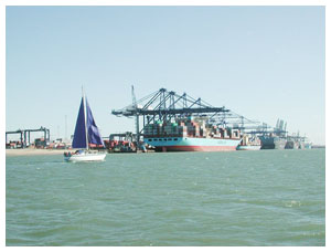 Container ships load and off load at Felixstowe Docks